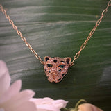 Diamond Tiger Necklace on a 18k Gold Chain with genuine emerald eyes. Available in Rose, White and Yellow Gold.