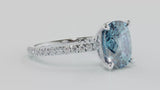 Specifications: 18k Pure Gold & ~3carats of Aquamarine  A special ring that cannot go unnoticed with a 3-carat cushion-cut aquamarine and a gorgeous hidden diamond halo! Don't hesitate to get in touch with us to customise the shape of the stone.  Available in 18K white, rose & yellow gold. Wear it alone or stacked with an eternity ring. Band width ~1.8mm.