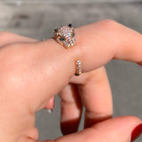 One of a kind Jaguar diamond ring, the ultimate statement piece, handmade and delicately crafted to bring forward every detail of the design. Simple open ring with dispersed diamonds and emerald eyes. 18k solid Gold