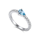 Full diamond Eternity band with a pear shaped Aquamarine Birthstone. 18K gold