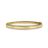14K solid Gold (9.7g), Pavé Diamonds (0.5 carats). A gorgeous bangle bracelet that would go perfectly alone or stacked for the perfect arm candy! The bangle has a safety clasp to keep it in place. Available in Yellow, White and Rose Gold.