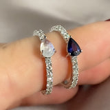 Full diamond Eternity band with a pear shaped Birthstones. 18K gold