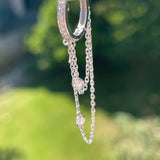 Huggie Earrings with floating Diamonds