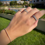 18k Pure Gold (3.5g) & ~2 carats of Marquise Diamonds (varies based on ring size). Eternity Diamond Ring with slanted marquise diamonds setting making this ring a gorgeous statement piece or a unique wedding band! Available in 18K white, rose & yellow gold.