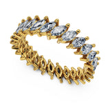 18k Pure Gold (3.5g) & ~2 carats of Marquise Diamonds (varies based on ring size). Eternity Diamond Ring with slanted marquise diamonds setting making this ring a gorgeous statement piece or a unique wedding band! Available in 18K white, rose & yellow gold.