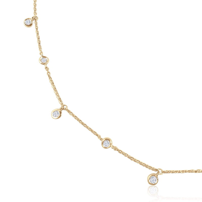 A classic must-have to complement any look, this rainfall 18k gold necklace features 11 set diamonds