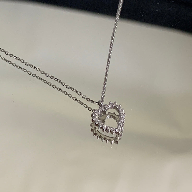 18K solid gold heart necklace with diamonds, perfect for layering. Available in yellow, rose and white gold