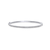 A classic thin Diamond bangle bracelet, elegant, effortless on its own and magnificent layered. The bangle has a safety clasp to keep it in place.  Available in 18K yellow, white and rose Gold.
