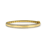 14K solid Gold (9.7g), Pavé Diamonds (0.5 carats). A gorgeous bangle bracelet that would go perfectly alone or stacked for the perfect arm candy! The bangle has a safety clasp to keep it in place. Available in Yellow, White and Rose Gold. 