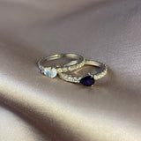 Full diamond Eternity band with a pear shaped Birthstones. 18K gold