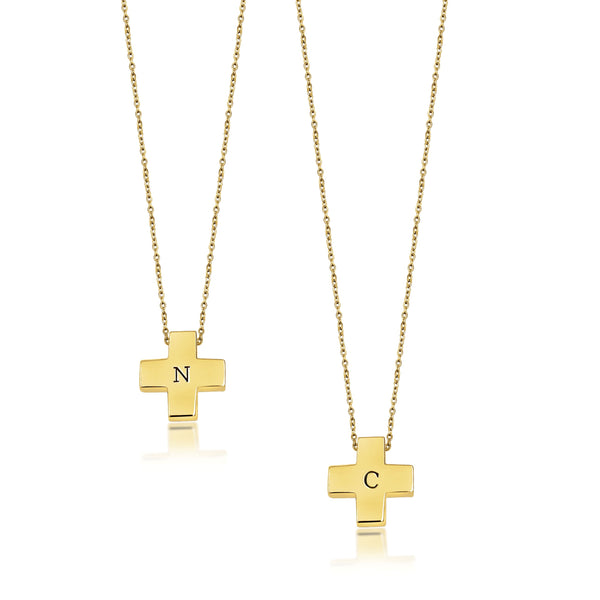 18K Pure Gold (5g). Made to resemble the swiss cross, this delicate pendant can be worn by adults and children and makes the perfect gift that defies the test of time. Available to order in Rose, White and Yellow gold. Chain is adjustable to 16, 18 and 20in (40, 45 and 50 cm), refer to the size guide for reference. Engraving of the letter of your choice is complimentary! 