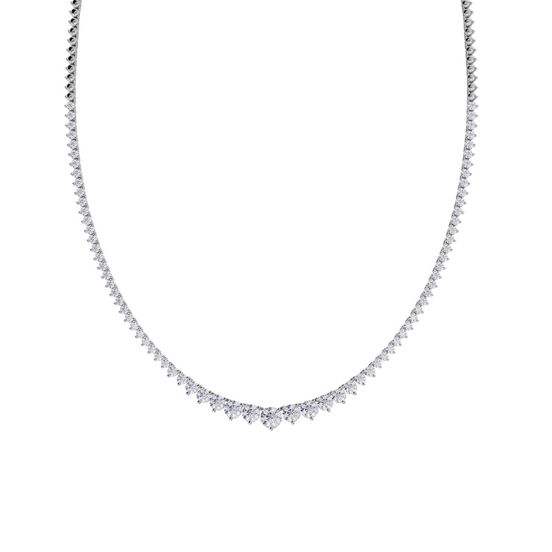 18K Solid Gold, Diamonds (~5 carats)  The classic Riviere Diamond Necklace designed with an uneven setting where the largest diamond in the middle is 0.25carats. Diamond color is G-F for the perfect sparkle.  This necklace comes in one standard size of 42.5cm (refer to Size Guide) and has a double closure clasp for extra security.   Available to order in rose, white and yellow gold. 