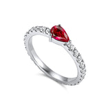 Full diamond Eternity band with a pear shaped ruby Birthstone. 18K gold