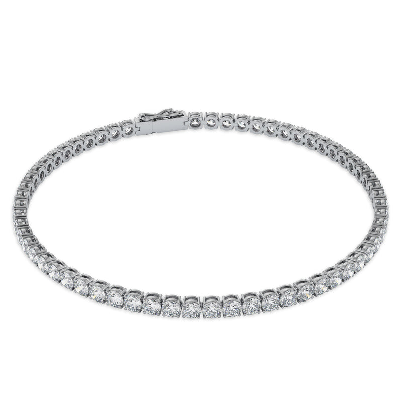 18K solid Gold, Round Diamonds color G-F with varying total carat size (2-7carats)  The classic tennis diamond bracelet is an old design that never gets out of trend. It elevates your style and adds a touch of modernity to your wrist. It is an item that gets passed on from mother to daughter, don't miss your chance on investing in this gorgeously classic item. Available in many carat sizes that match your style and budget!  Available in Yellow, White and Rose Gold. Payment facilities available at check out.
